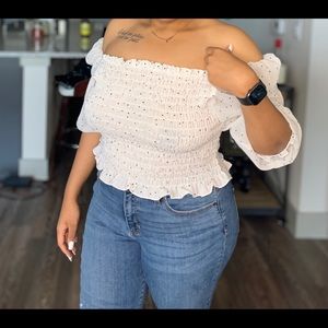 White top w/ Black polka- dots